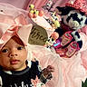 Crystal is registered to the contest to win money with this photo: baby, pink_bow, infant, cake, three_months, plush_toy, cow, pink_hat, pink_boots, celebration, soft_fabric, portrait, cute, festive, child, smiling_toy, decorations, background, clothing, closeup