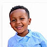 Eliab is registered to the contest to win money with this photo: child, boy, smiling, happy, face, portrait, curly_hair, blue_shirt, casual_clothing, white_background, teeth, eyes, head_and_shoulders, cute, young, person, cheerful, outdoor_light, skin, expression
