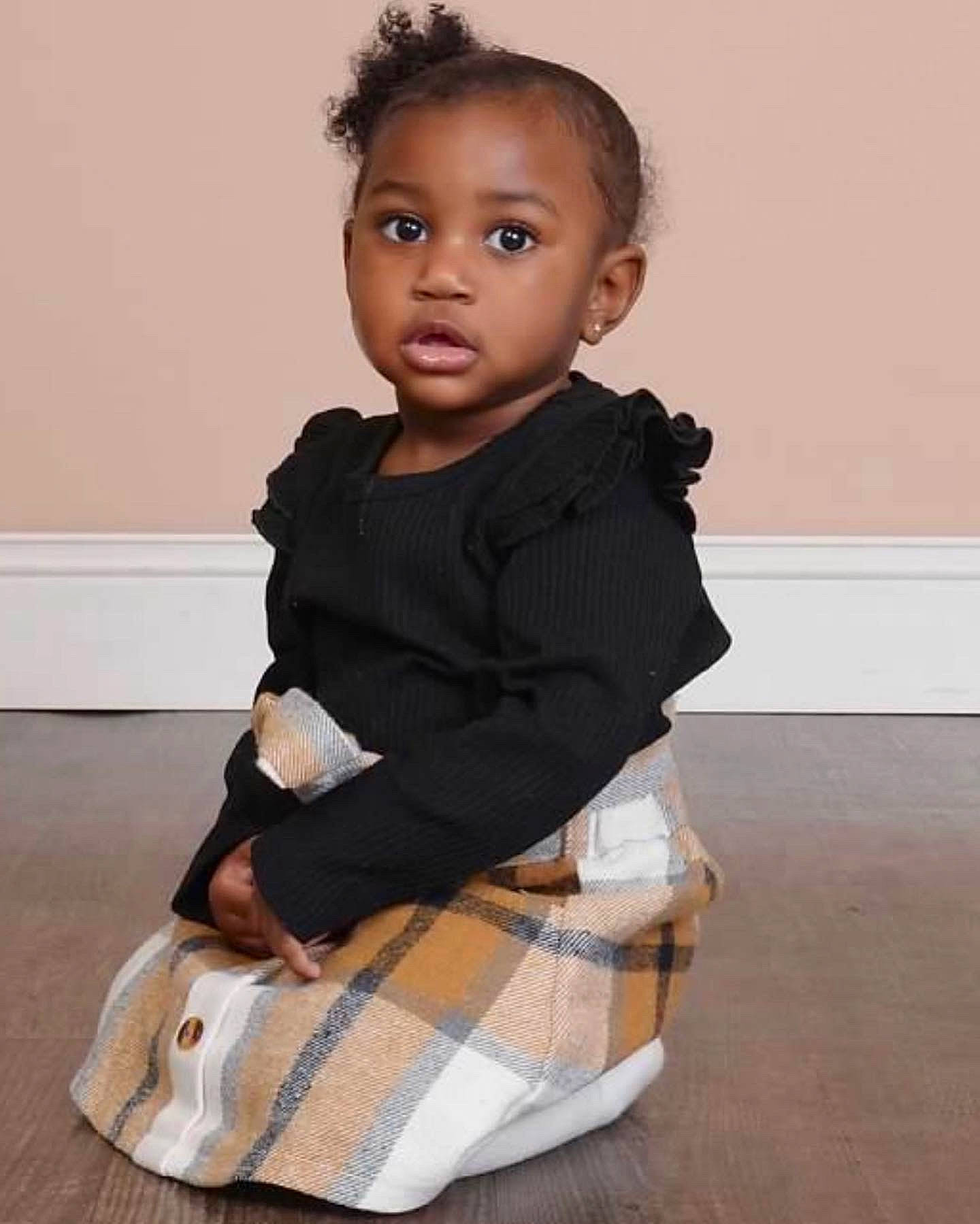 Brielle is registered to the contest to win money with this photo: arm, baby_toddler_clothing, collar, dress_shirt, fashion_design, flash_photography, flooring, formal_wear, knee, leg, neck, pattern, person, plaid, shoulder, sleeve, street_fashion, tartan, toddler, waist