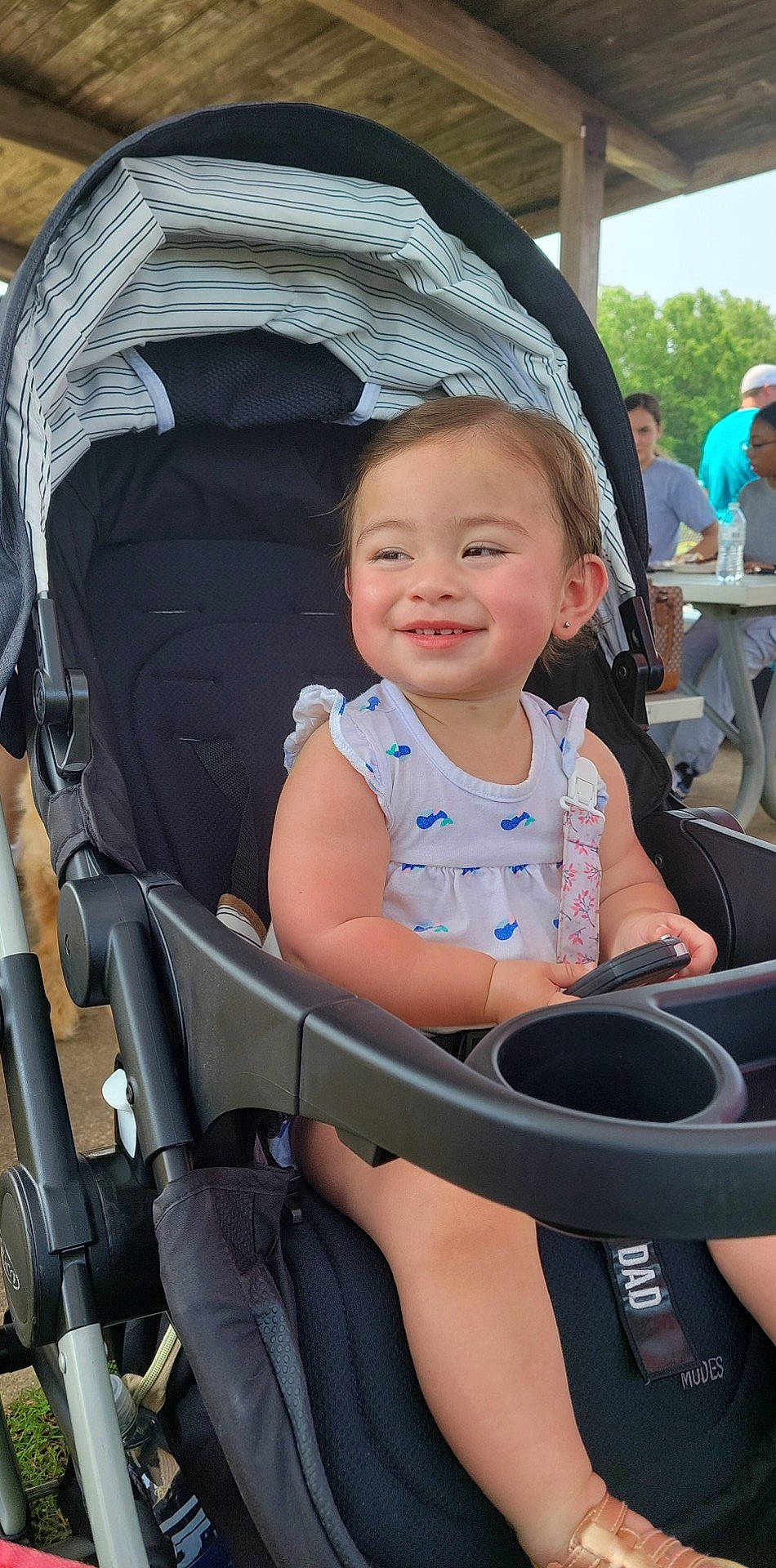 Juliana is registered to the contest to win money with this photo: baby_carriage, baby_products, blue, chair, child, comfort, eye, fun, happy, hat, head, joy, lap, leisure, person, plant, product, sitting, smile, tire