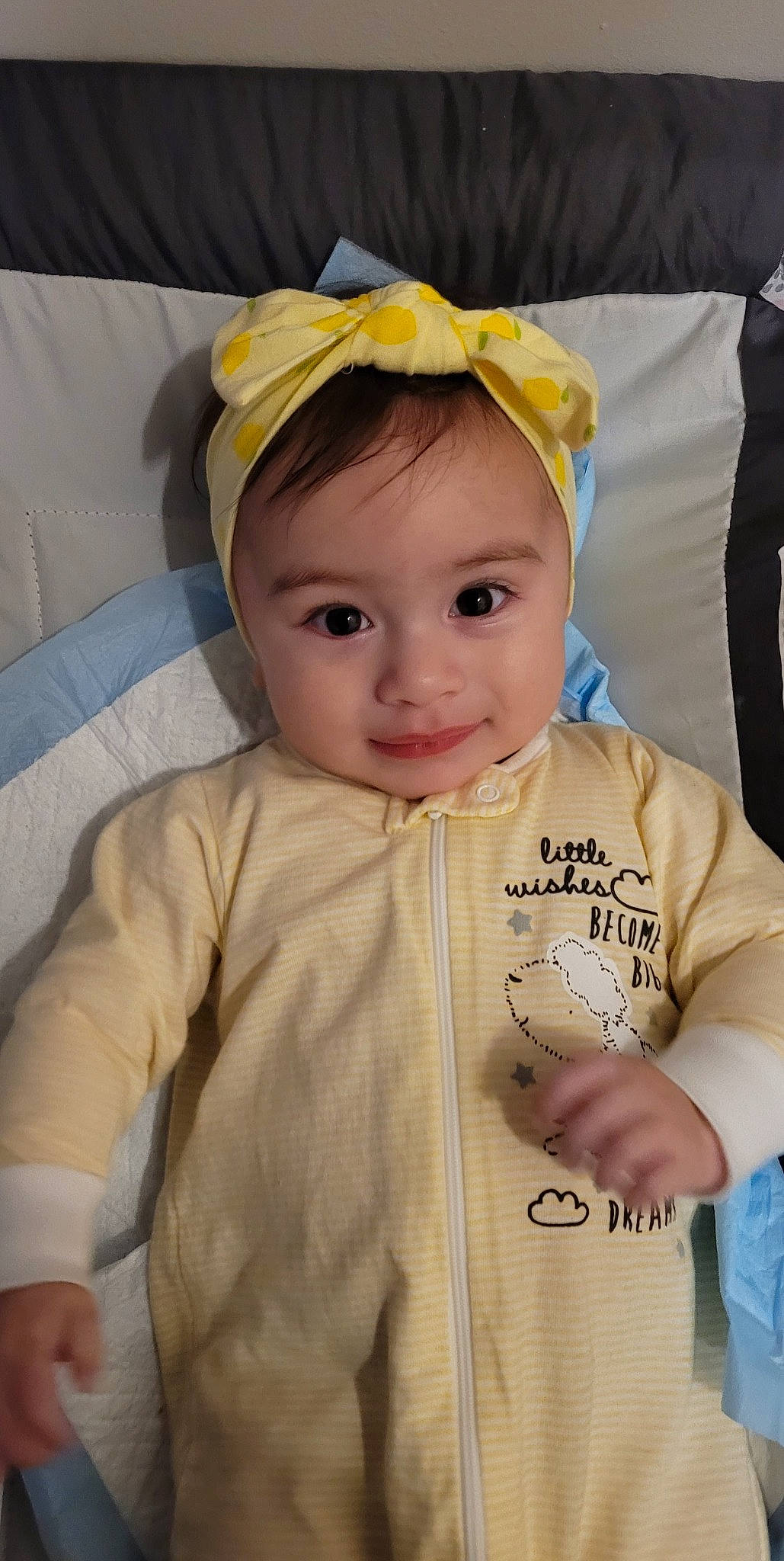 Juliana is registered to the contest to win money with this photo: baby, baby_toddler_clothing, cap, cheek, child, chin, eye, facial_expression, fashion_accessory, fun, gesture, hairstyle, happy, headband, headpiece, person, skin, sleeve, smile, t_shirt