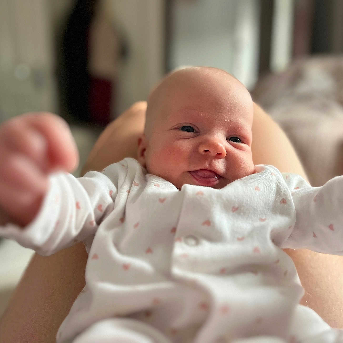 Freyja is registered to the contest to win money with this photo: architecture, baby, bodypart, building, clothing, face, finger, glove, hand, happy, head, hospital, newborn, person, photography, portrait, sleeping, smile