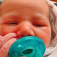 Ryker joined the competition — help win amazing prizes! baby, newborn, pacifier, hand, face, skin, blanket, striped, infant, closeup, sleepy, cute, child, tiny_fingers, mouth, nose, eyes, soft, wrapped, indoors