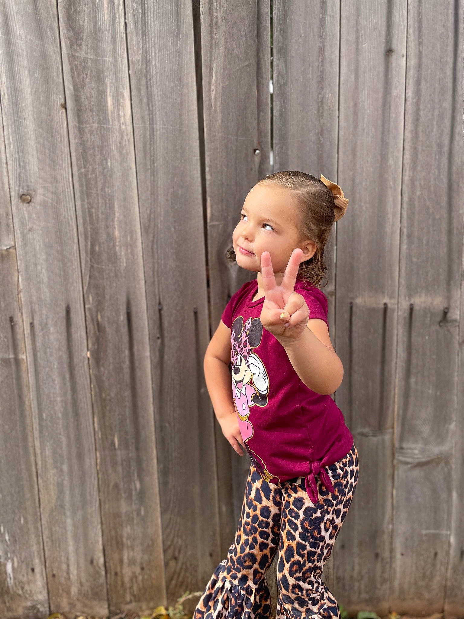 Journey is registered to the contest to win money with this photo: abdomen, beauty, child, eye, flash_photography, fun, grass, happy, leisure, magenta, people_in_nature, person, pink, sleeve, sportswear, t_shirt, thigh, toddler, trunk, waist