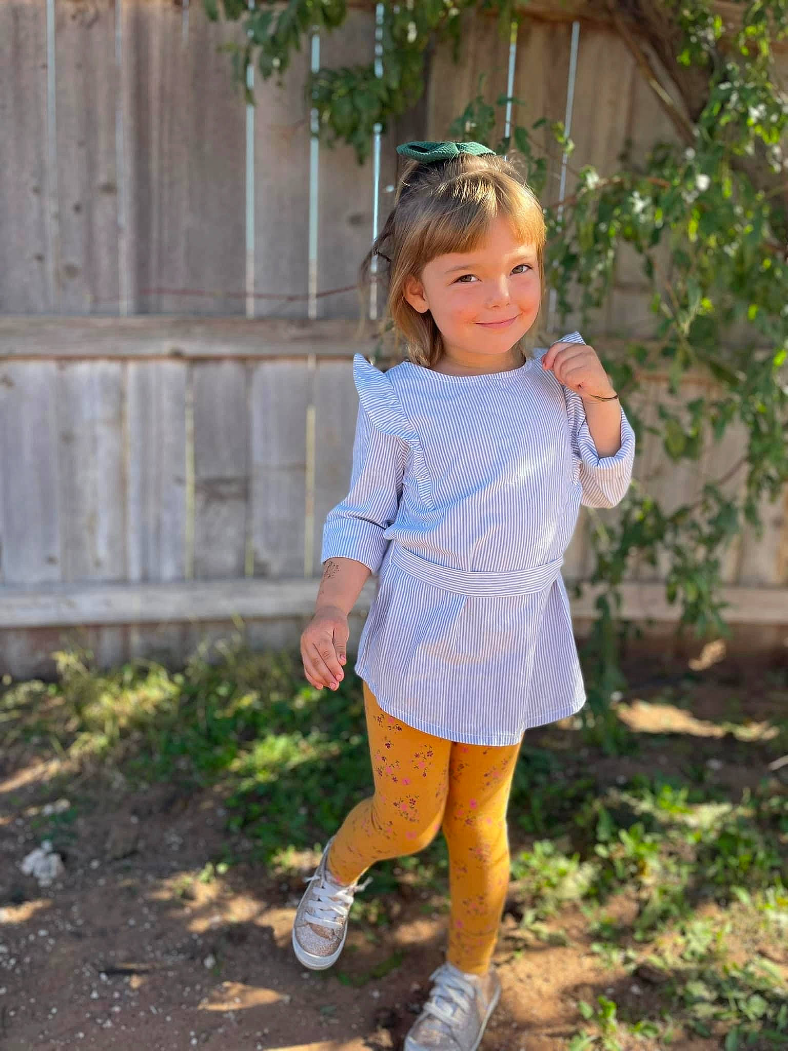 Journey is registered to the contest to win money with this photo: blond, brown_hair, child, denim, dress, electric_blue, face, fawn, grass, hair, happy, joy, knee, pattern, people_in_nature, person, plaid, plant, sleeve, toddler