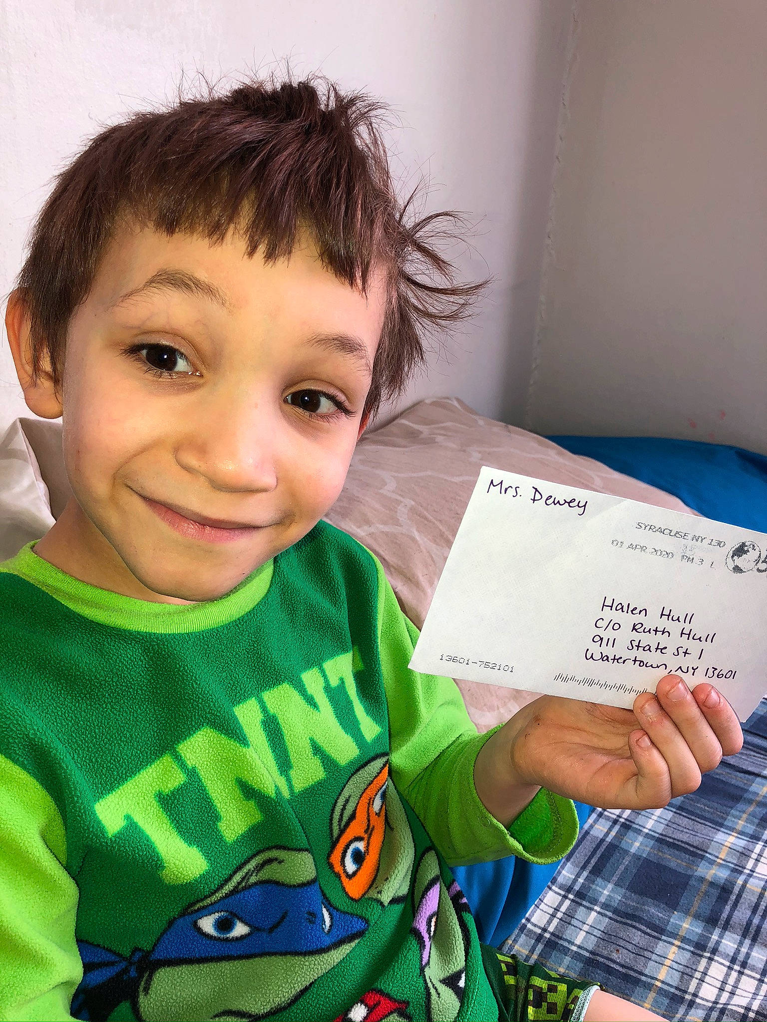 Halen joined the competition — help win amazing prizes! baby, baby_toddler_clothing, child, clothing, couch, eyelash, finger, grass, hairstyle, hand, happy, jacket, joy, pattern, person, plaid, sitting, sleeve, smile, t_shirt