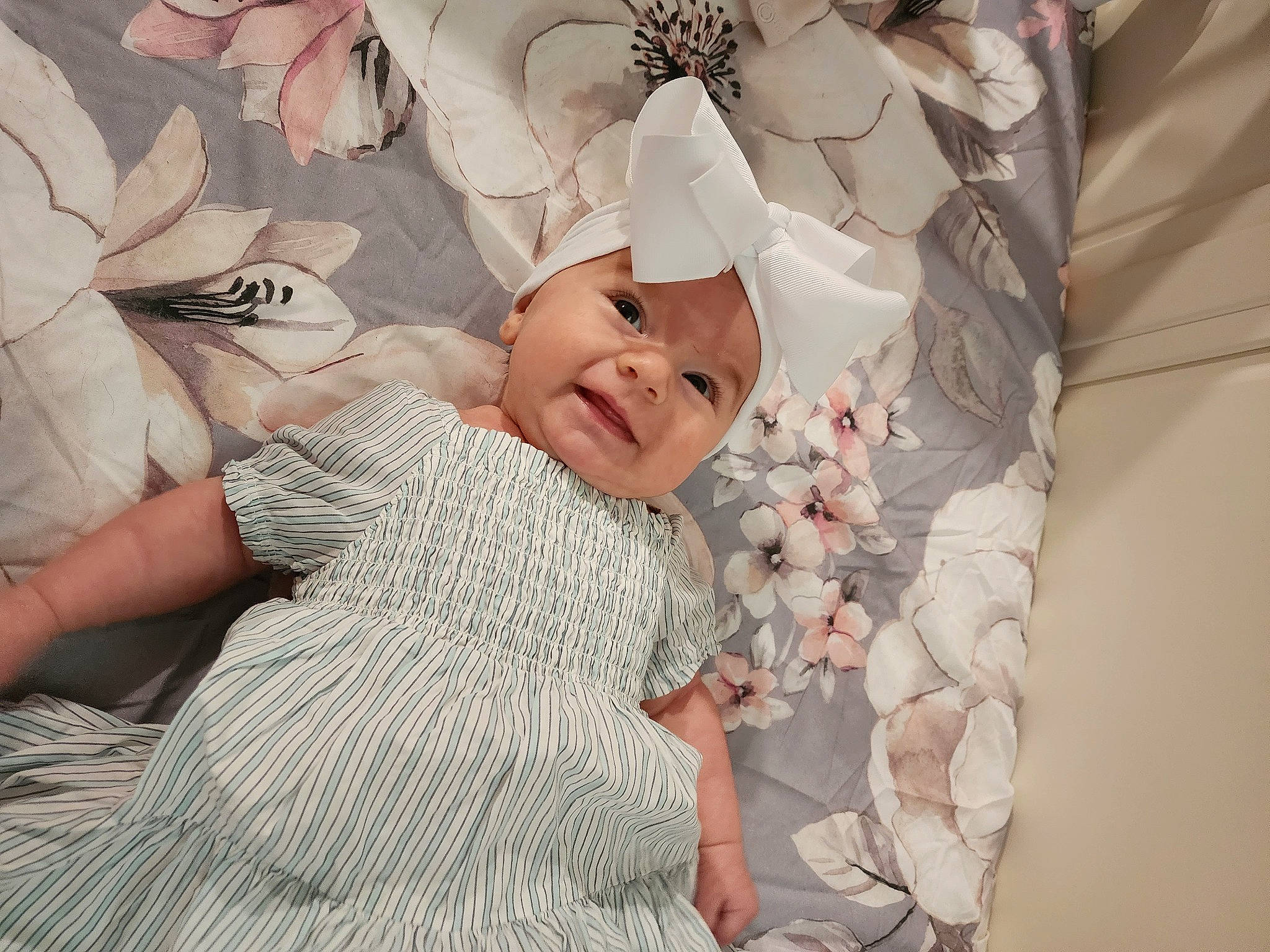 Allison joined the competition — help win amazing prizes! art, baby, baby_products, baby_sleeping, baby_toddler_clothing, bedding, bedtime, child, comfort, gesture, happy, headwear, linens, pattern, peach, person, petal, pink, portrait_photography, room