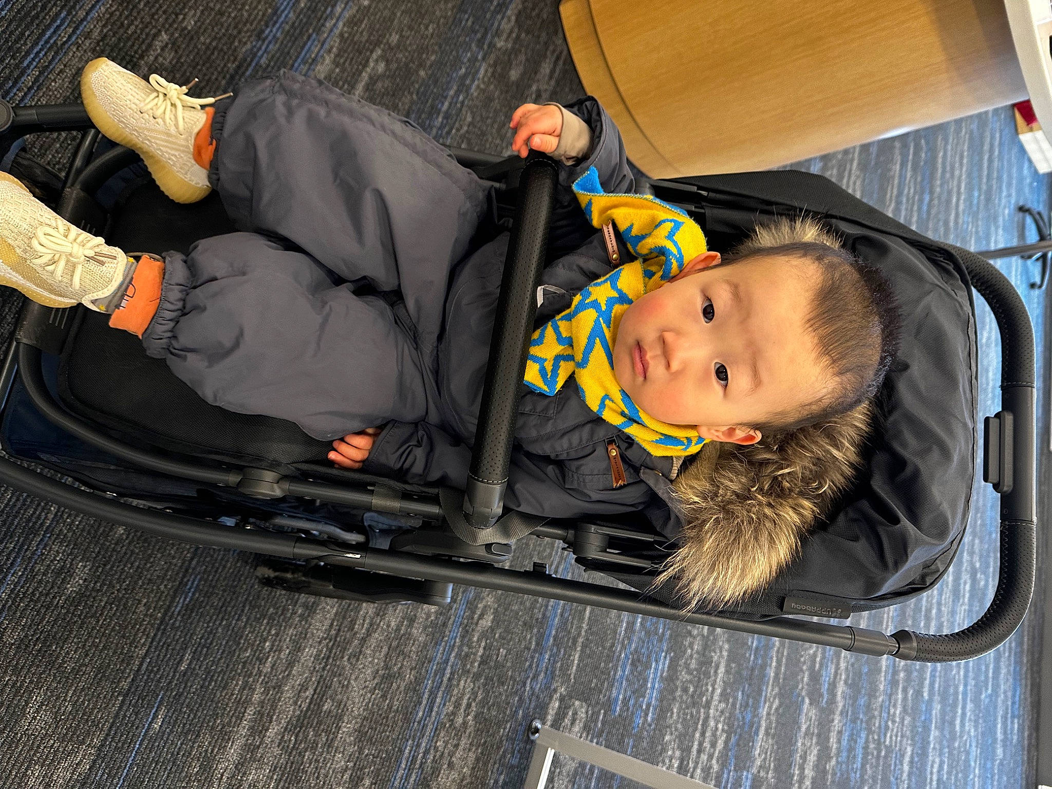 Mateo joined the competition — help win amazing prizes! auto_part, baby, baby_carriage, baby_products, baby_safety, baby_toddler_clothing, child, comfort, fun, leisure, outdoor_shoe, person, sitting, toddler, tree, walking_shoe