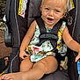 Olivia joined the competition — help win amazing prizes! baby, blond_hair, car_seat, child, cute, face, floral_dress, foot, happy, head, infant, outdoor, person, playful, safety_harness, seat, seatbelt, skin, smiling, toddler