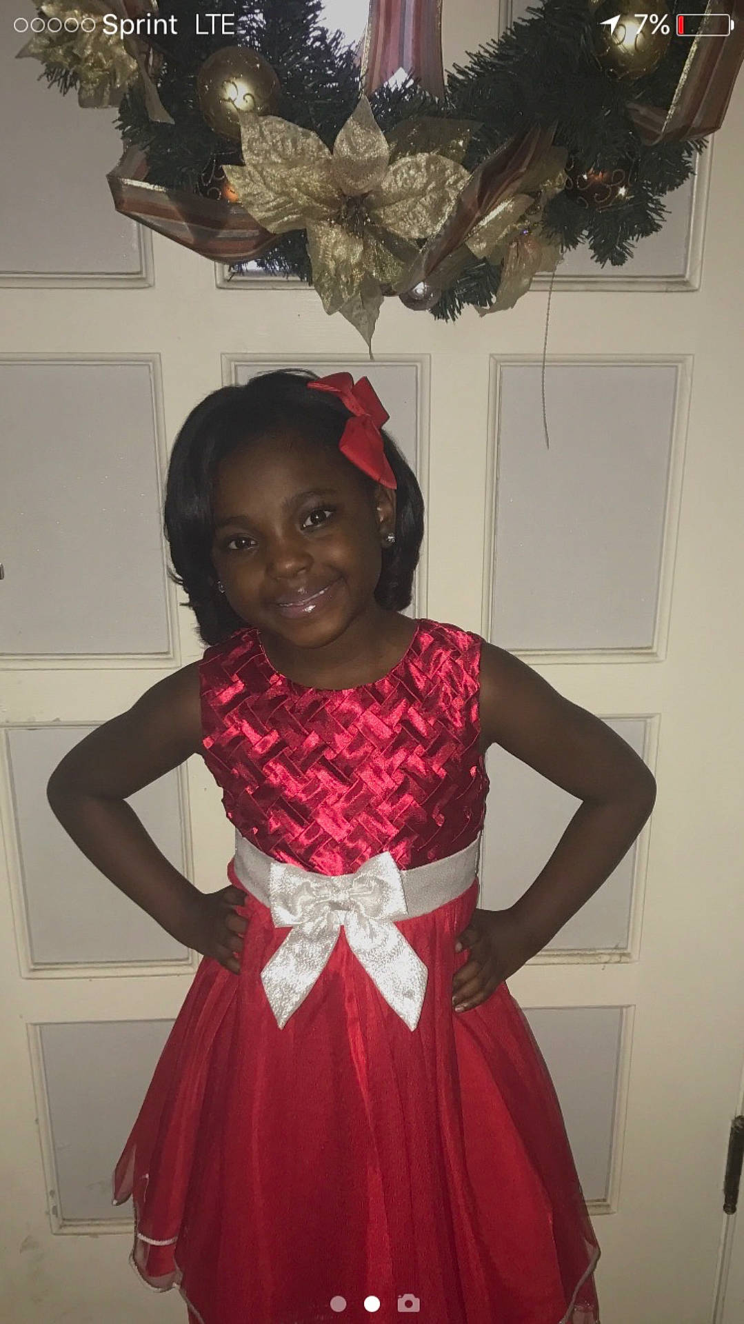 Londyn joined the competition — help win amazing prizes! costume, dress, event, fashion_accessory, fun, girl, hair, hair_accessory, hairstyle, headgear, joy, person, red, smile, textile, tradition