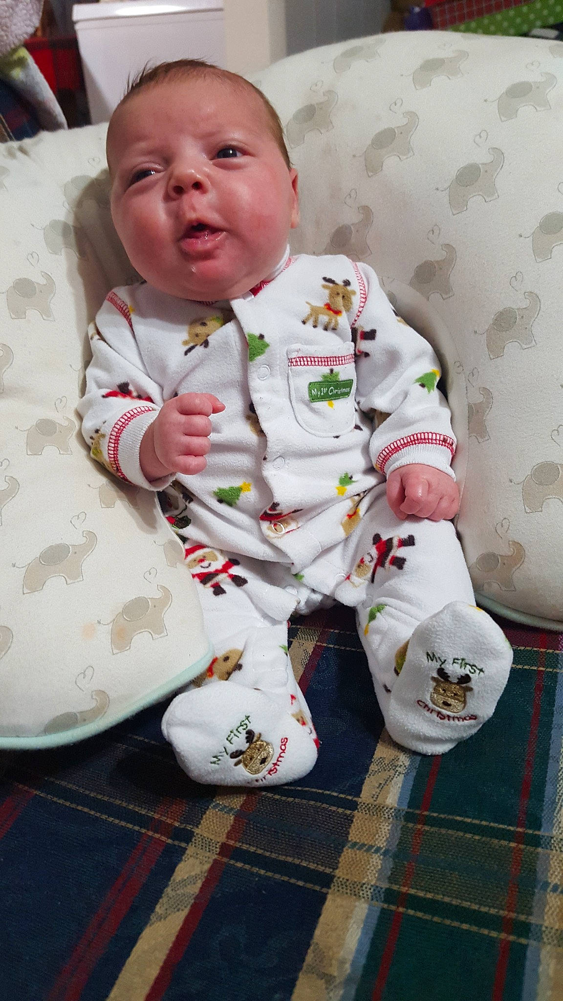 Sheila is registered to the contest to win money with this photo: child, day, fun, infant, material, person, play, product, sitting, skin, smile, textile, toddler, white