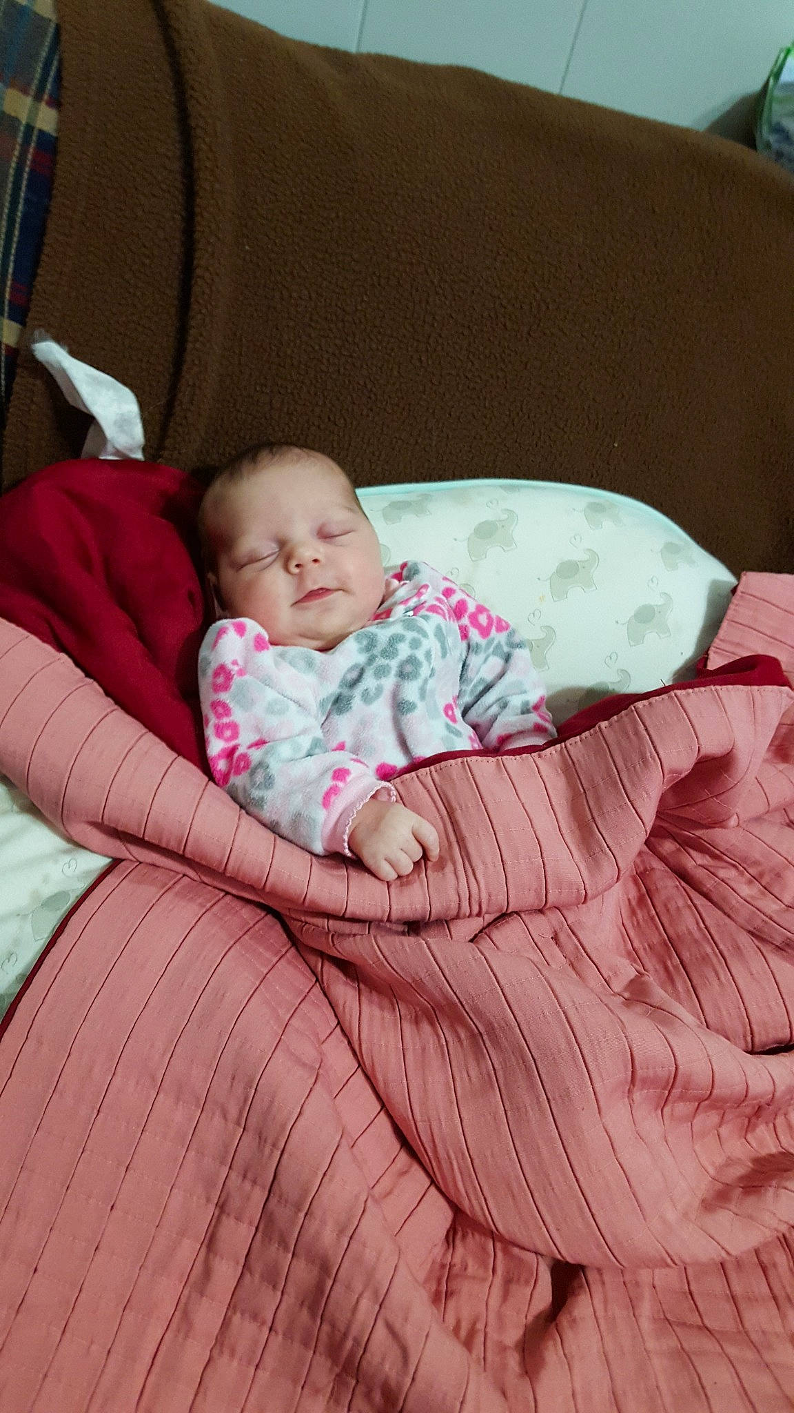 Sheila is registered to the contest to win money with this photo: baby_products, bed, bedtime, child, day, eye, fun, girl, infant, nap, person, pink, product, sitting, skin, sleep, textile, toddler