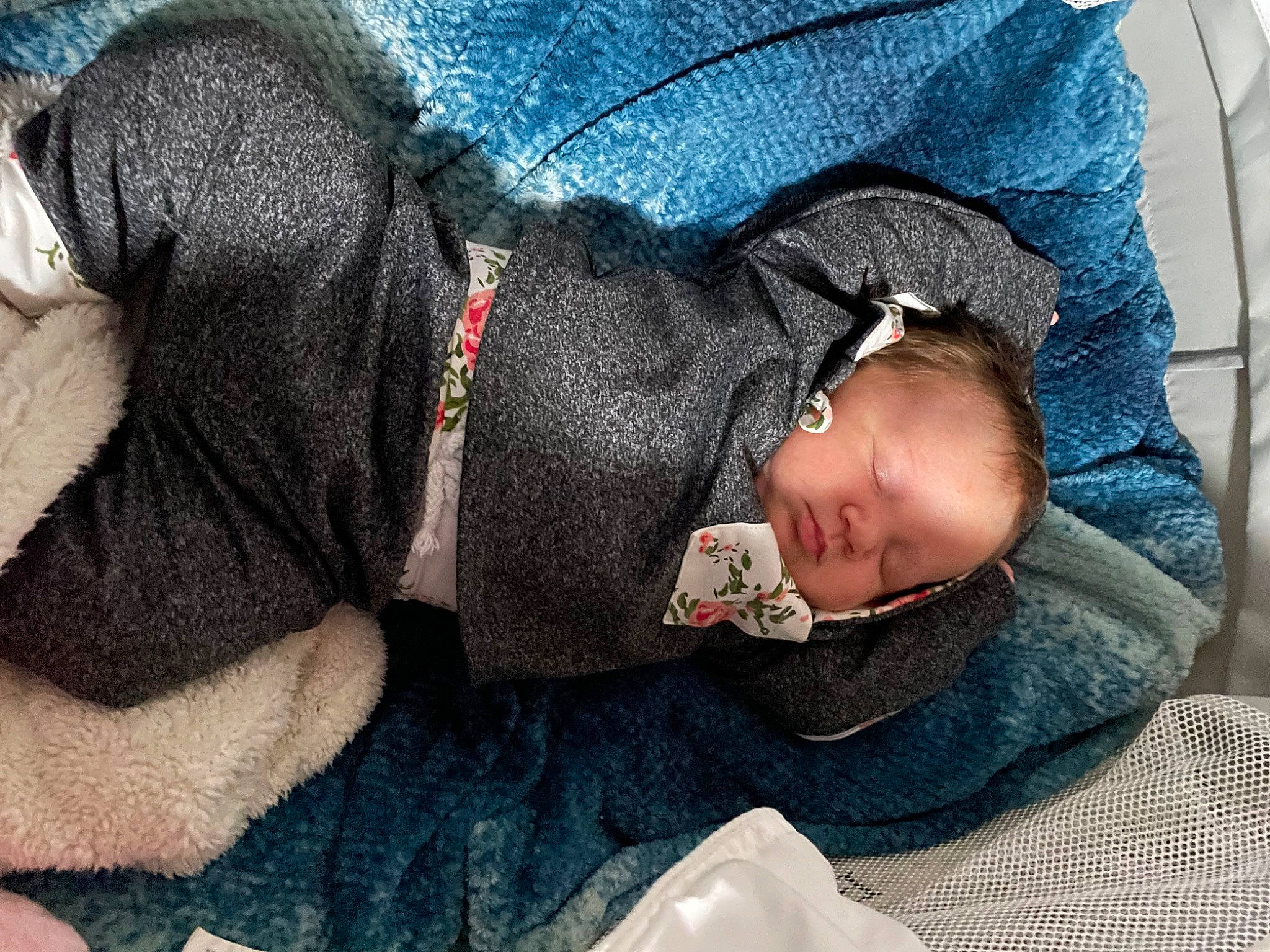 Mazie joined the competition — help win amazing prizes! baby, baby_products, baby_sleeping, baby_toddler_clothing, beanie, child, comfort, fashion_accessory, fur, hat, headgear, linens, nap, person, sitting, sleep, sleeve, toddler, tree, wool