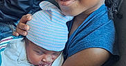 Tina joined the competition — help win amazing prizes! affection, baby, blanket, casual_clothing, child, closeup, cuddle, family, happy, hat, indoor, love, newborn, person, portrait, seated, skin, smile, tender, toddler