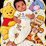 Tiana is registered to the contest to win money with this photo: baby, bear, blanket, cartoon_characters, child, clothing, colorful, curly_hair, cute, donkey, foot, infant, lying_down, playful, portrait, smiling, soft_texture, striped_pants, tiger, winnie_the_pooh