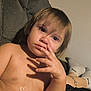 toddler, child, sad, wet, shirtless, face, hand, chair, socks, tattoo, legs, indoor, expression, portrait, young_child, person, skin, hair, closeup, seated