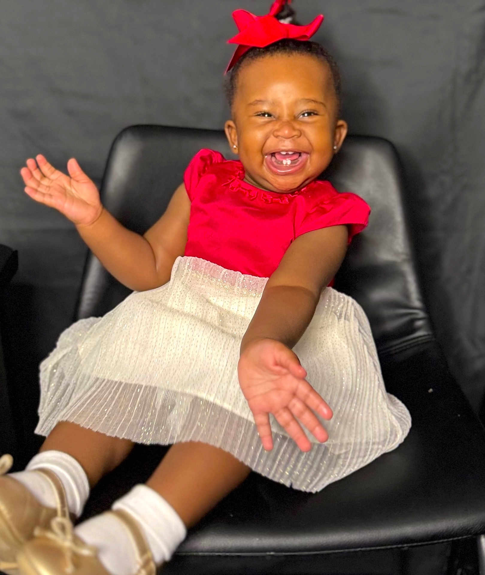 Alia joined the competition — help win amazing prizes! child, toddler, smiling, happy, dress, red, white, bow, chair, black, shoes, socks, portrait, cute, joy, baby, fashion, indoor, celebration, person