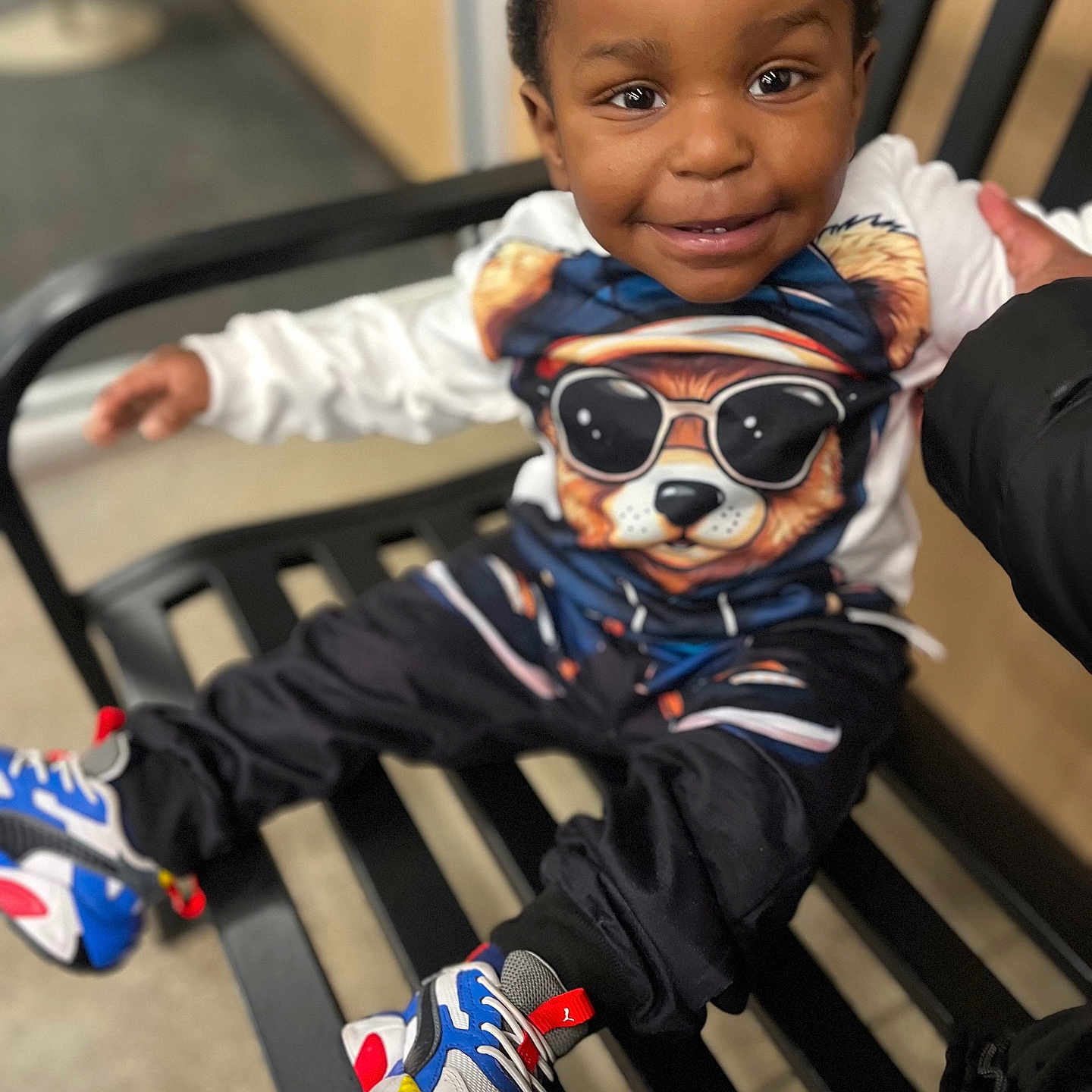 Dusen is registered to the contest to win money with this photo: accessories, adult, baby, bag, clothing, face, footwear, glasses, handbag, happy, head, male, man, person, photography, portrait, shoe, sitting, smile, sneaker