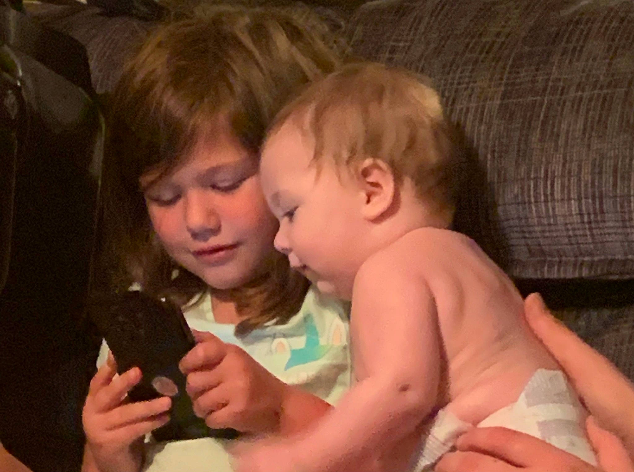 Joelle is registered to the contest to win money with this photo: arm, blond, cheek, child, comfort, couch, event, finger, fun, gesture, hand, happy, iris, lap, nail, nose, person, sharing, skin, thumb