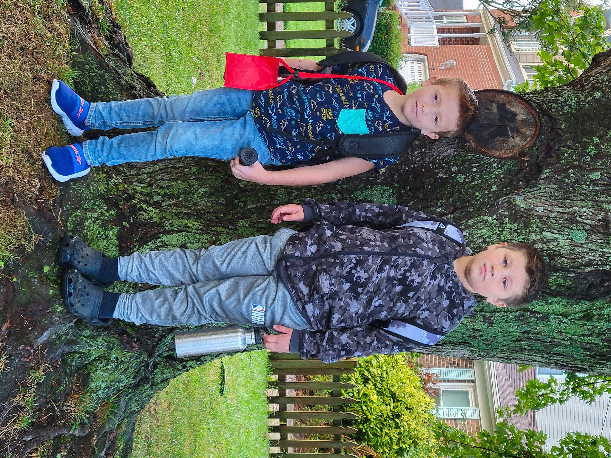 Liam joined the competition — help win amazing prizes! boot, clothing, denim, electric_blue, footwear, fun, grass, green, leisure, military_camouflage, outdoor_shoe, pattern, people_in_nature, person, plant, shoe, shrub, sneakers, thigh, tree