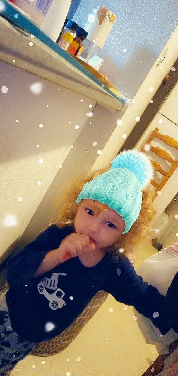 ézéchiel participe au concours pour gagner de l'argent avec cette photo : baby, baby_toddler_clothing, beanie, cap, ceiling, child, costume, costume_hat, event, fashion_accessory, fun, fur, happy, hat, headgear, headwear, party_supply, person, room, sleeve