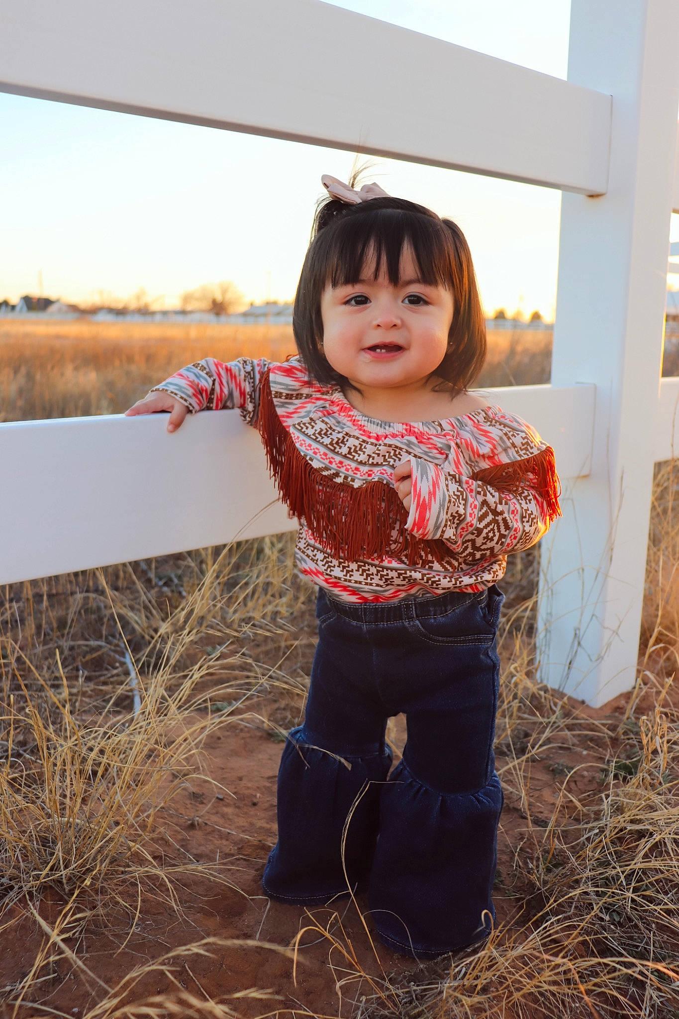Elani is registered to the contest to win money with this photo: agriculture, baby, baby_toddler_clothing, child, field, fun, grass, happy, hay, joy, landscape, people_in_nature, person, prairie, sitting, sky, sleeve, soil, standing, toddler