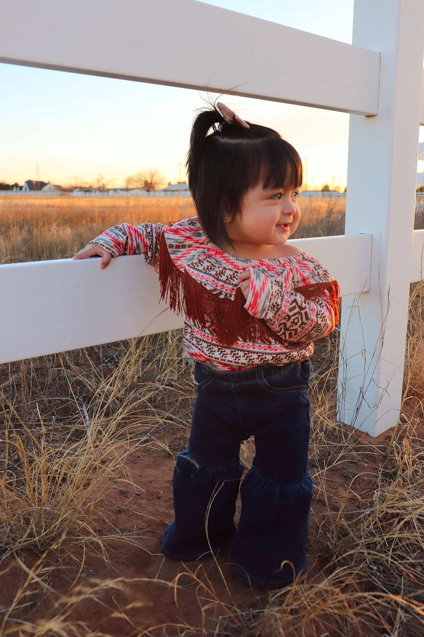 Elani is registered to the contest to win money with this photo: agriculture, baby_toddler_clothing, child, fun, grass, grassland, happy, hay, human, landscape, people_in_nature, person, sitting, sky, sleeve, soil, standing, tints_and_shades, toddler, travel