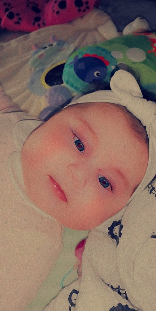 Shemsy participe au concours pour gagner de l'argent avec cette photo : baby, baby_toddler_clothing, cap, cheek, chin, eye, eyebrow, eyelash, face, facial_expression, head, headgear, iris, lip, nose, person, pink, skin, sleeve, textile