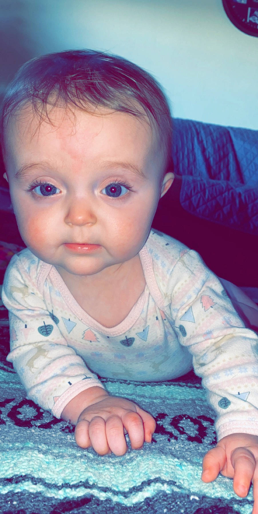 Raelynn is registered to the contest to win money with this photo: baby, beauty, cheek, child, chin, eye, eyebrow, face, facial_expression, forehead, hair, head, iris, lip, nose, person, sitting, skin, smile, toddler
