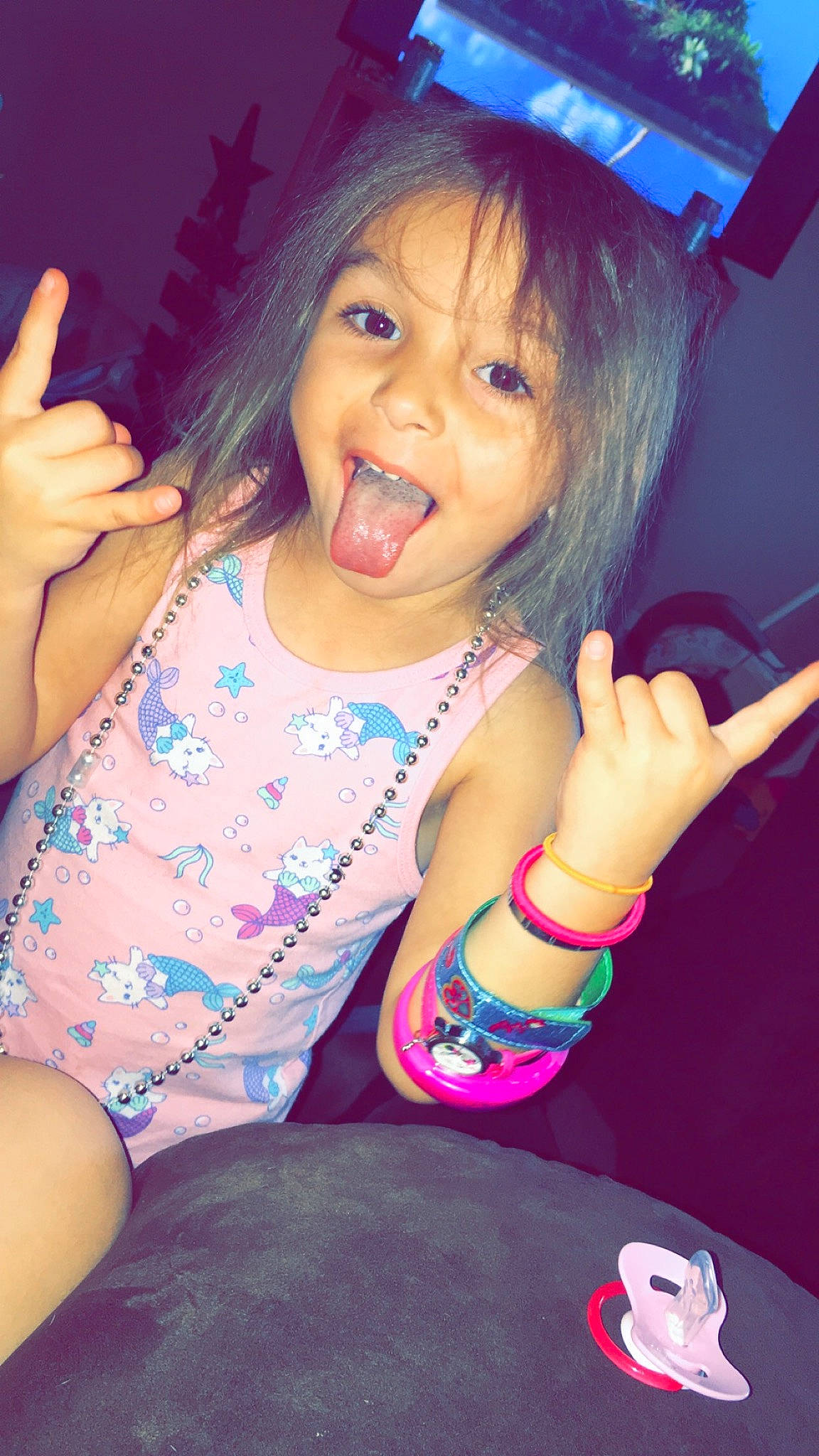 Taliah joined the competition — help win amazing prizes! black_hair, child, cool, finger, fun, gesture, hand, happy, joy, long_hair, mouth, nose, person, photography, pink, play, skin, smile, thumb, toddler