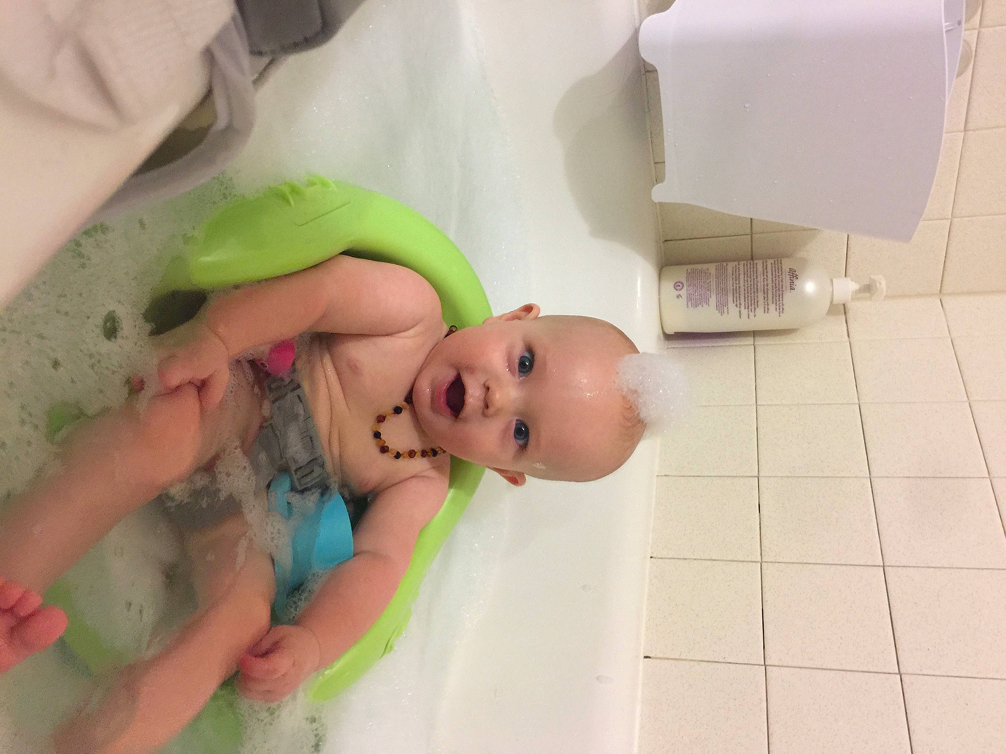 Gideon is registered to the contest to win money with this photo: abdomen, baby, baby_products, baby_safety, baby_sleeping, baby_toddler_clothing, bed, child, comfort, eyelash, flooring, fun, happy, linens, person, pink, product, room, skin, smile