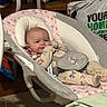 Marilyn joined the competition — help win amazing prizes! baby, baby_rocker, infant, onesie, pacifier, face, person, indoor, cushion, fabric, pattern, furniture, wood, carpet, household_items, blanket, comfort, child, cute, relaxing