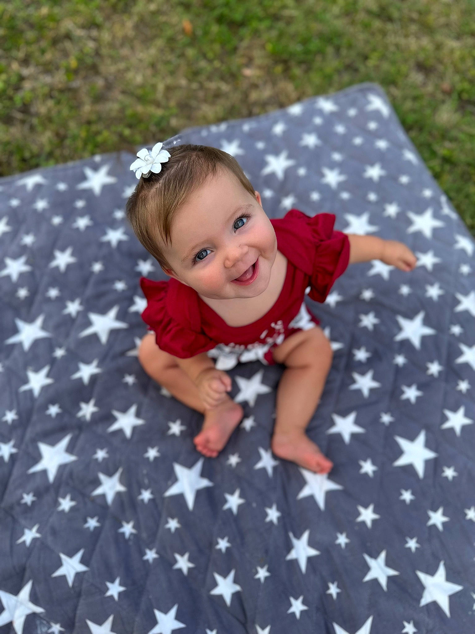 Saylor joined the competition — help win amazing prizes! baby, baby_toddler_clothing, child, flooring, fun, grass, happy, joy, leaf, mammal, pattern, people_in_nature, person, petal, plant, purple, sleeve, smile, textile, toddler