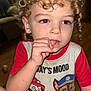 Maxton joined the competition — help win amazing prizes! cartoon, casual_clothing, child, curly, curly_hair, cute, expression, face, floor, home, indoor, light, person, portrait, red_shirt, skin, thumb_sucking, toddler, tshirt, young_child