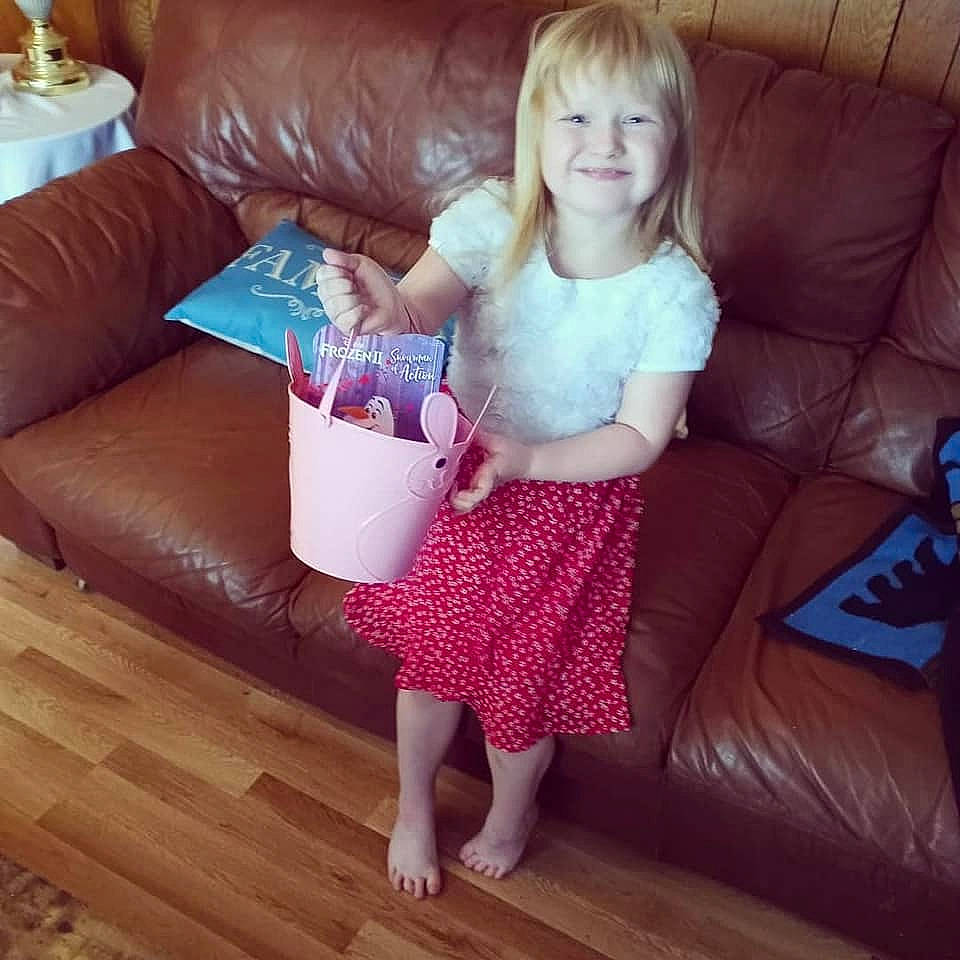 Saoirse joined the competition — help win amazing prizes! beauty, comfort, couch, face, finger, floor, flooring, hair, hardwood, human_leg, joy, knee, lap, living_room, organ, person, purple, smile, studio_couch, textile