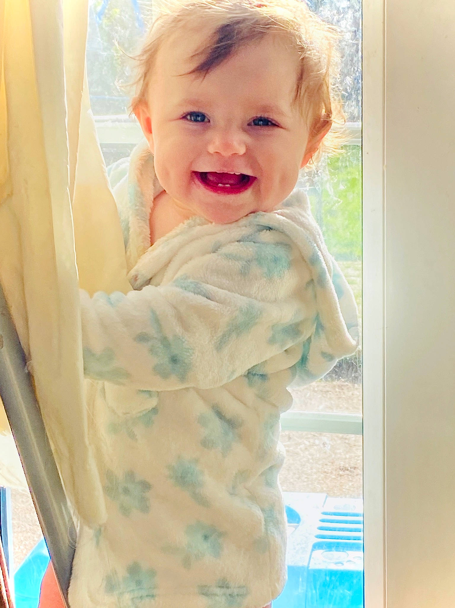 Cody is registered to the contest to win money with this photo: baby, blond, child, face, facial_expression, fun, hair, happy, head, joy, neck, nose, person, skin, sleeve, smile, toddler, vacation