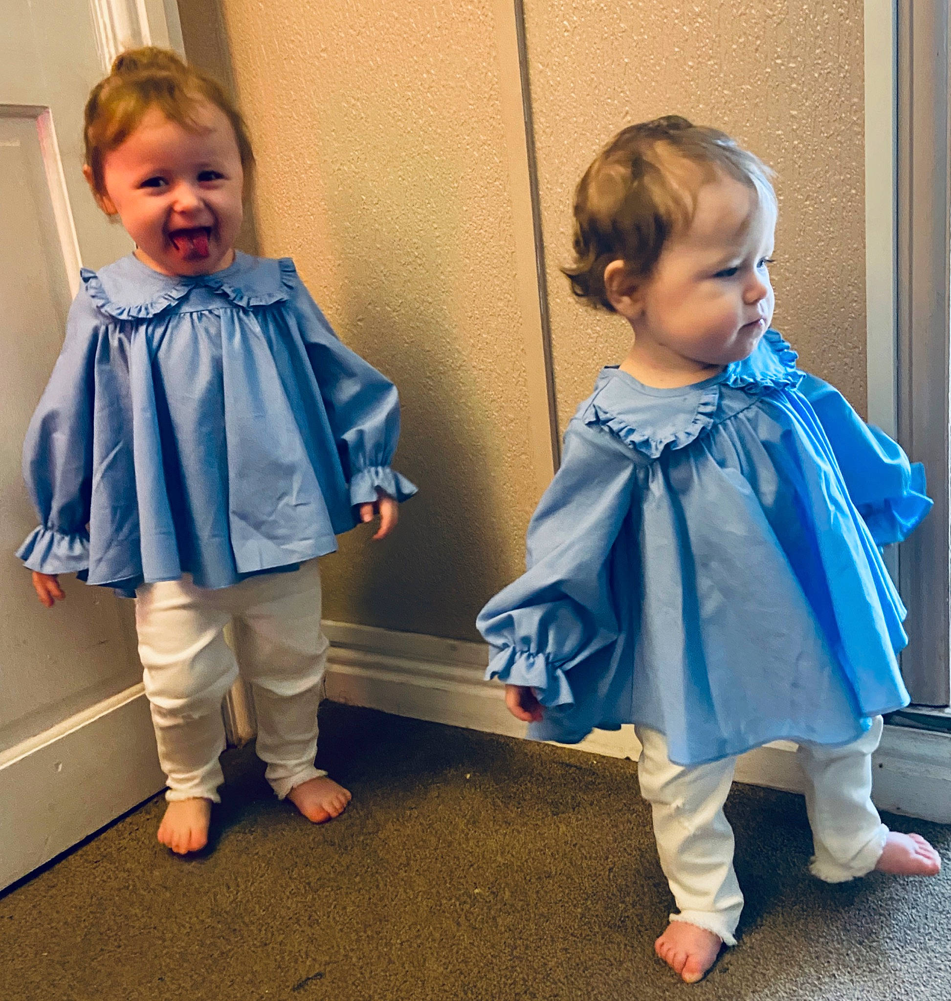 Annie is registered to the contest to win money with this photo: baby, baby_toddler_clothing, blue, child, clothing, costume, dress, footwear, outerwear, pattern, person, play, ruffle, shoe, shoulder, sleeve, textile, toddler