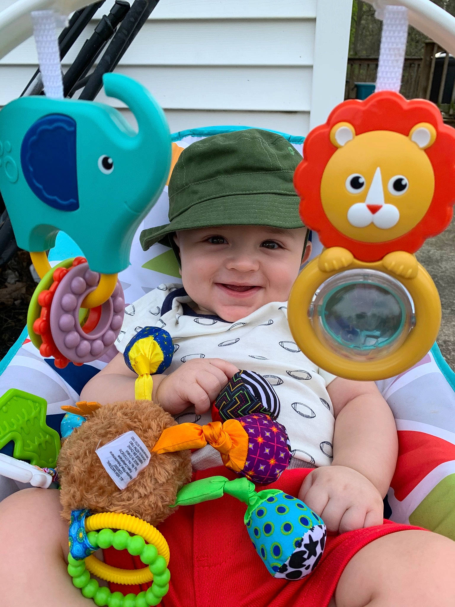 George is registered to the contest to win money with this photo: baby, baby_products, baby_toys, child, ear, headwear, joy, person, play, plush, product, stuffed_toy, teddy_bear, textile, toddler, toy, vacation
