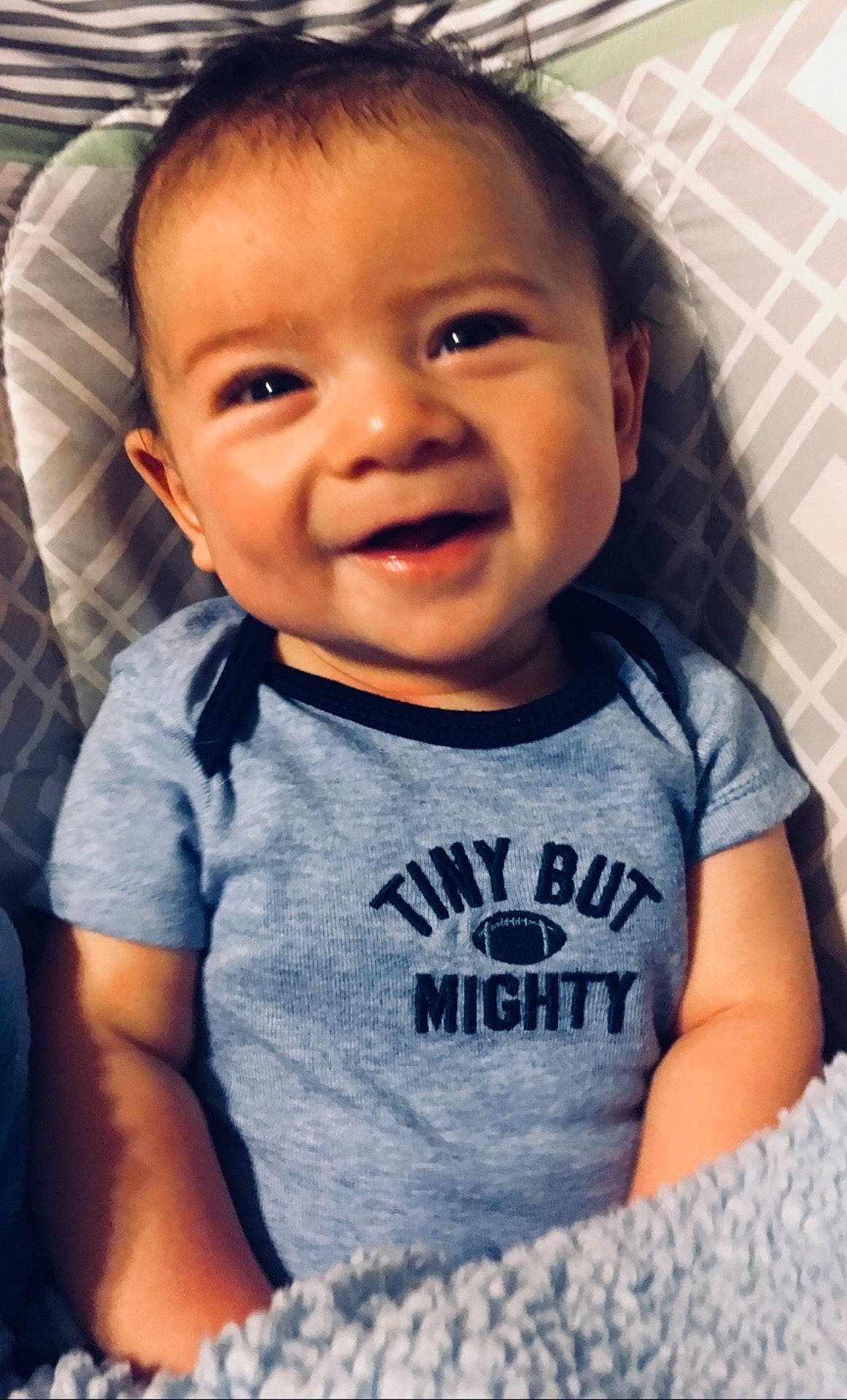 Bodey is registered to the contest to win money with this photo: boy, cheek, child, cool, day, emotion, eye, face, facial_expression, fun, girl, head, infant, nose, person, product, sitting, skin, smile, toddler