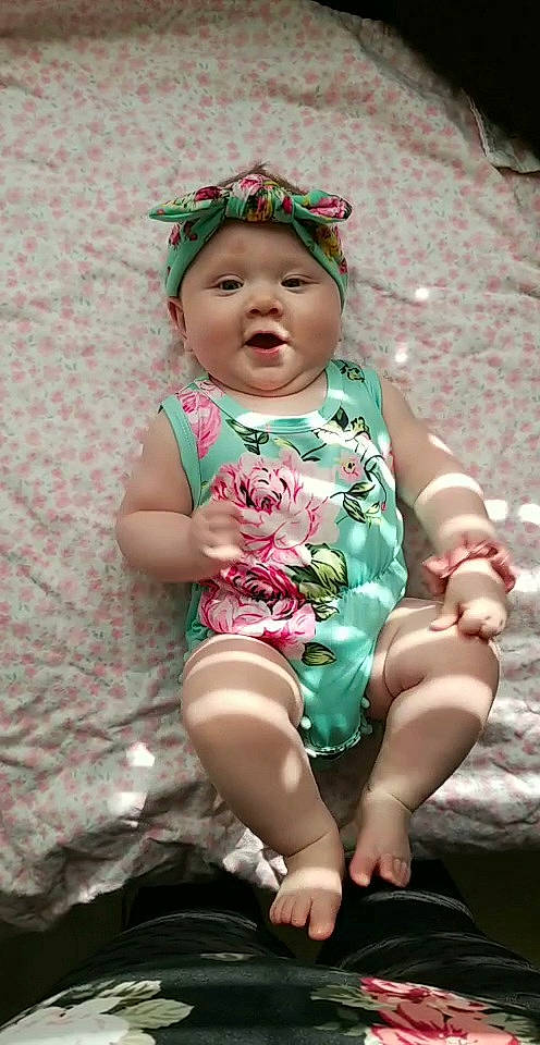 Matilda joined the competition — help win amazing prizes! baby_toddler_clothing, beauty, cheek, child, chin, dress, eye, grass, happy, head, headgear, headwear, human, leg, magenta, pattern, person, pink, sitting, skin