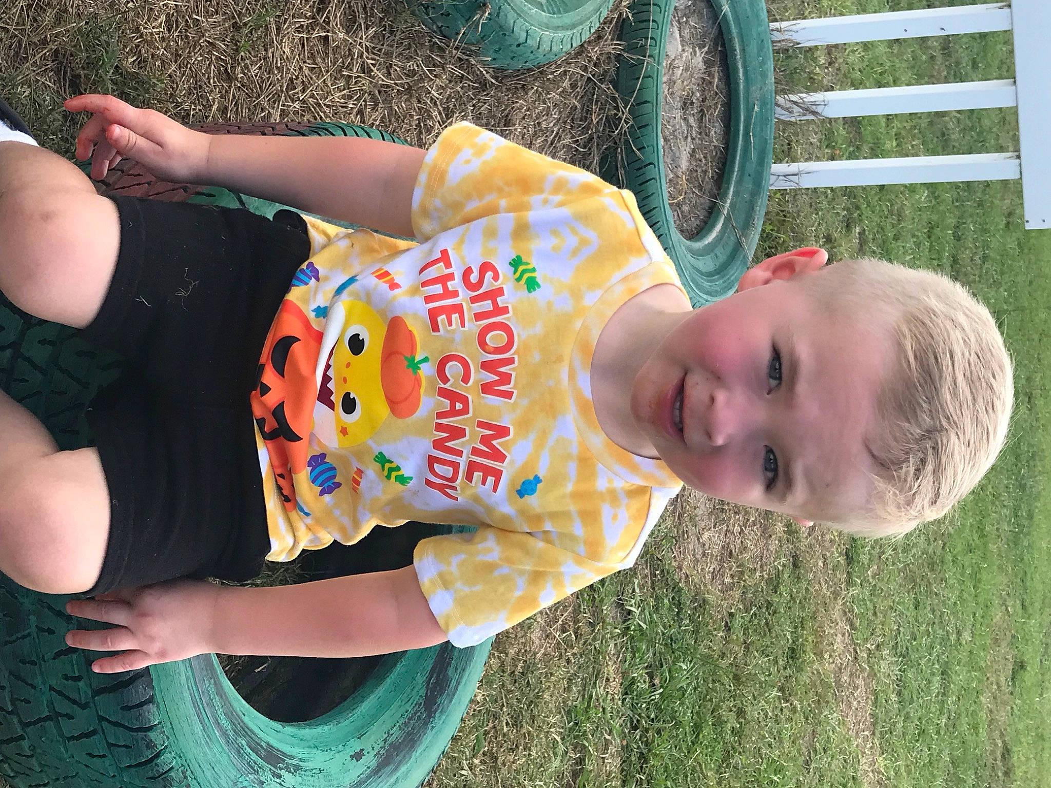 Brendan is registered to the contest to win money with this photo: baby, baby_toddler_clothing, child, cool, facial_expression, fun, grass, green, happy, hat, leisure, light, people_in_nature, person, skin, smile, sunlight, thigh, toddler, water