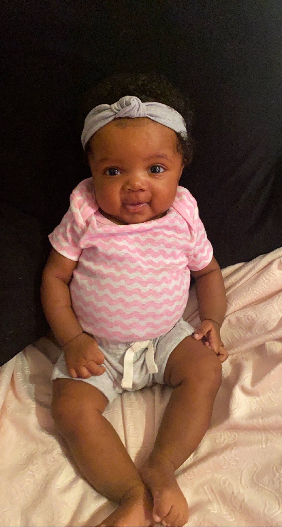 Ja'Mourii is registered to the contest to win money with this photo: baby, baby_toddler_clothing, cap, cheek, comfort, dress, finger, hat, head, human_body, iris, lip, mouth, neck, person, pink, skin, sleeve, stomach, t_shirt