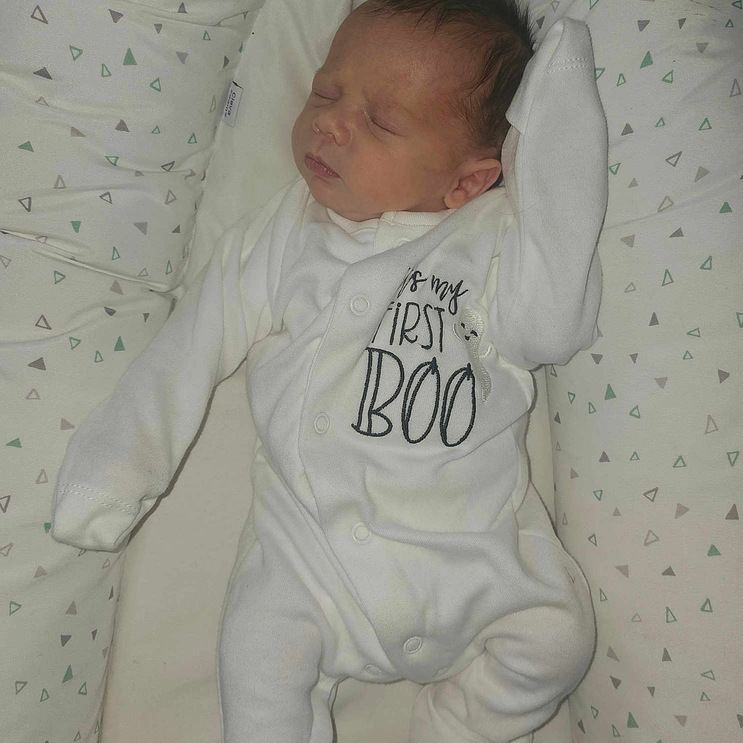 Auley joined the competition — help win amazing prizes! baby, bed, child, cushion, face, foot, hand, head, indoors, infant, newborn, onesie, pattern, peaceful, portrait, rest, sleeping, soft_fabric, triangles, white_clothing