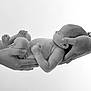 Cléo participe au concours pour gagner de l'argent avec cette photo : baby, infant, hands, black_and_white, newborn, gentle, care, tenderness, portrait, skin, parent, holding, human, support, closeup, peaceful, resting, adult, monochrome, love