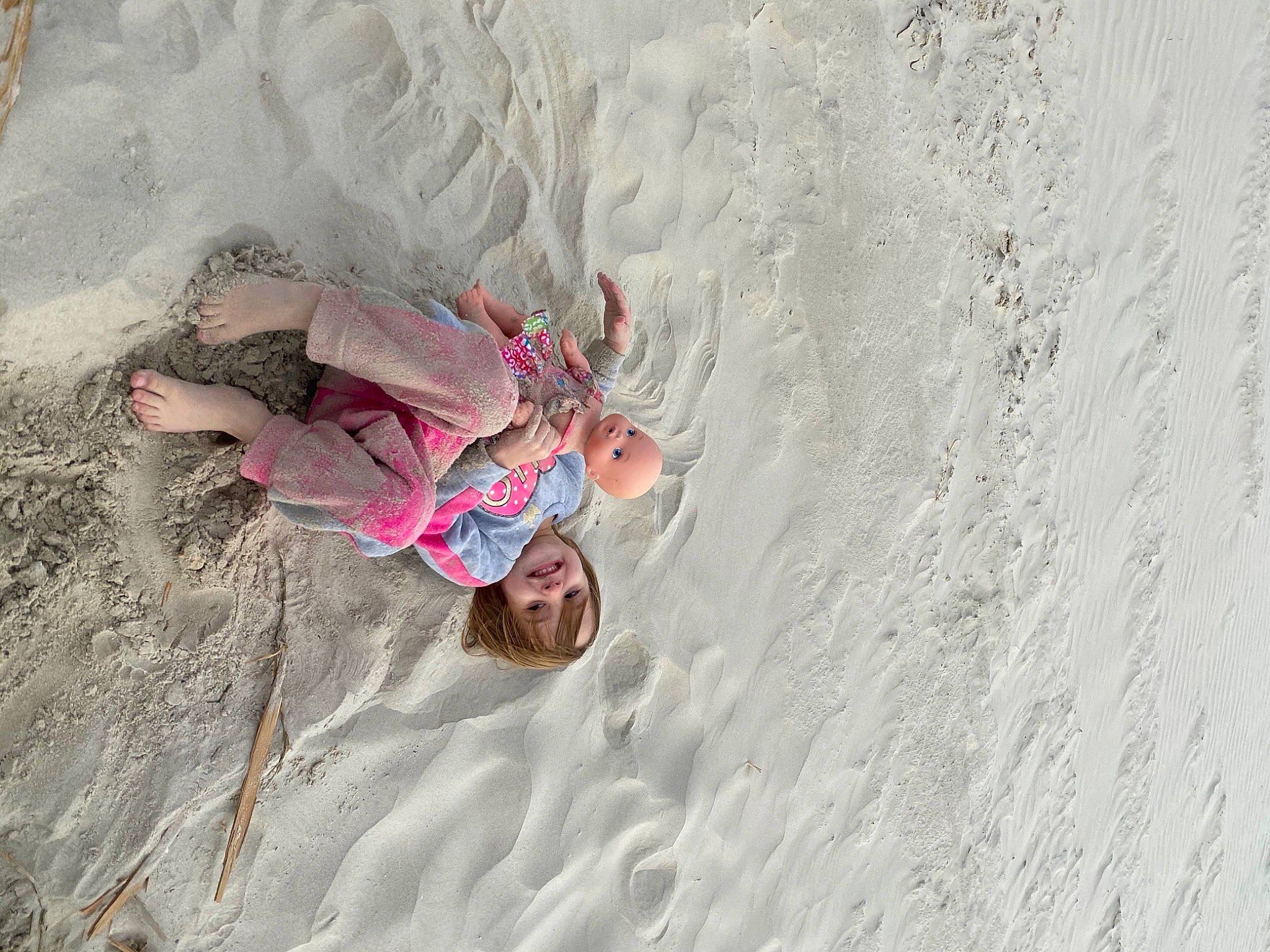 River joined the competition — help win amazing prizes! beach, building_material, fun, joy, people_on_beach, person, sand, vacation