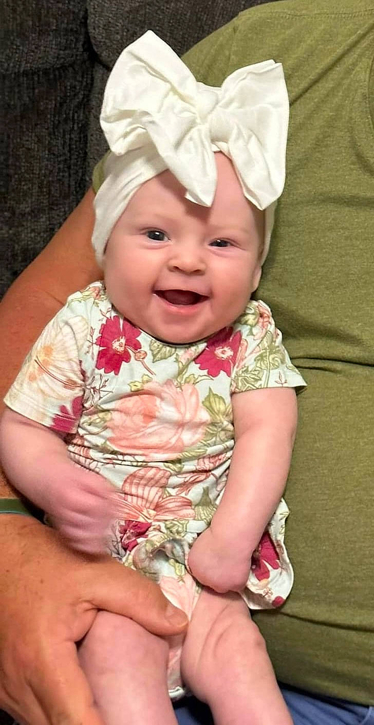Parker joined the competition — help win amazing prizes! baby, baby_laughing, baby_toddler_clothing, beauty, cap, cheek, child, eye, face, facial_expression, fun, hand, happy, headgear, headwear, pattern, person, pink, skin, sleeve