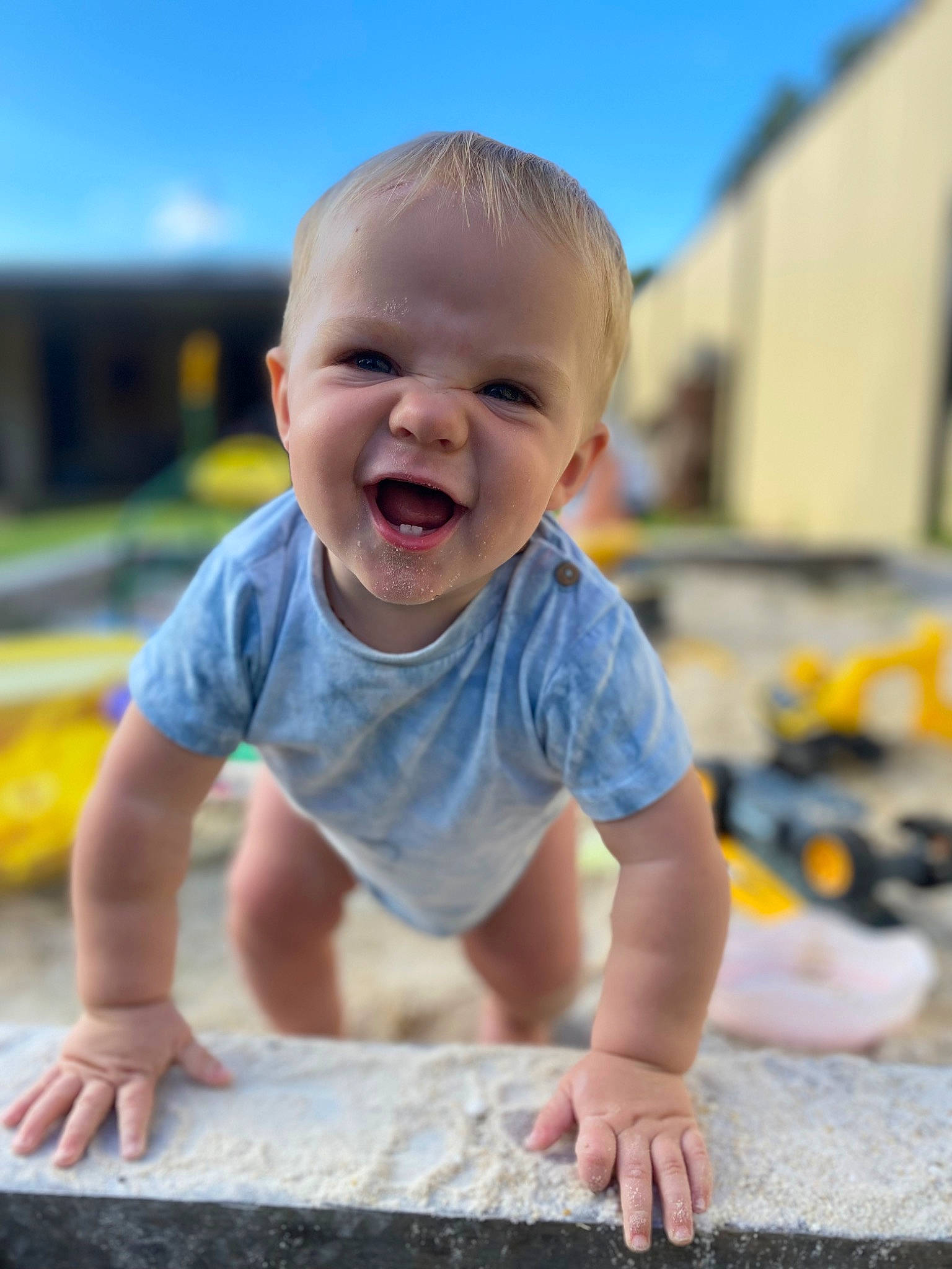 Jai joined the competition — help win amazing prizes! baby, baby_toddler_clothing, child, facial_expression, finger, flooring, fun, grass, happy, human_body, leg, leisure, person, skin, sky, sleeve, smile, standing, t_shirt, toddler