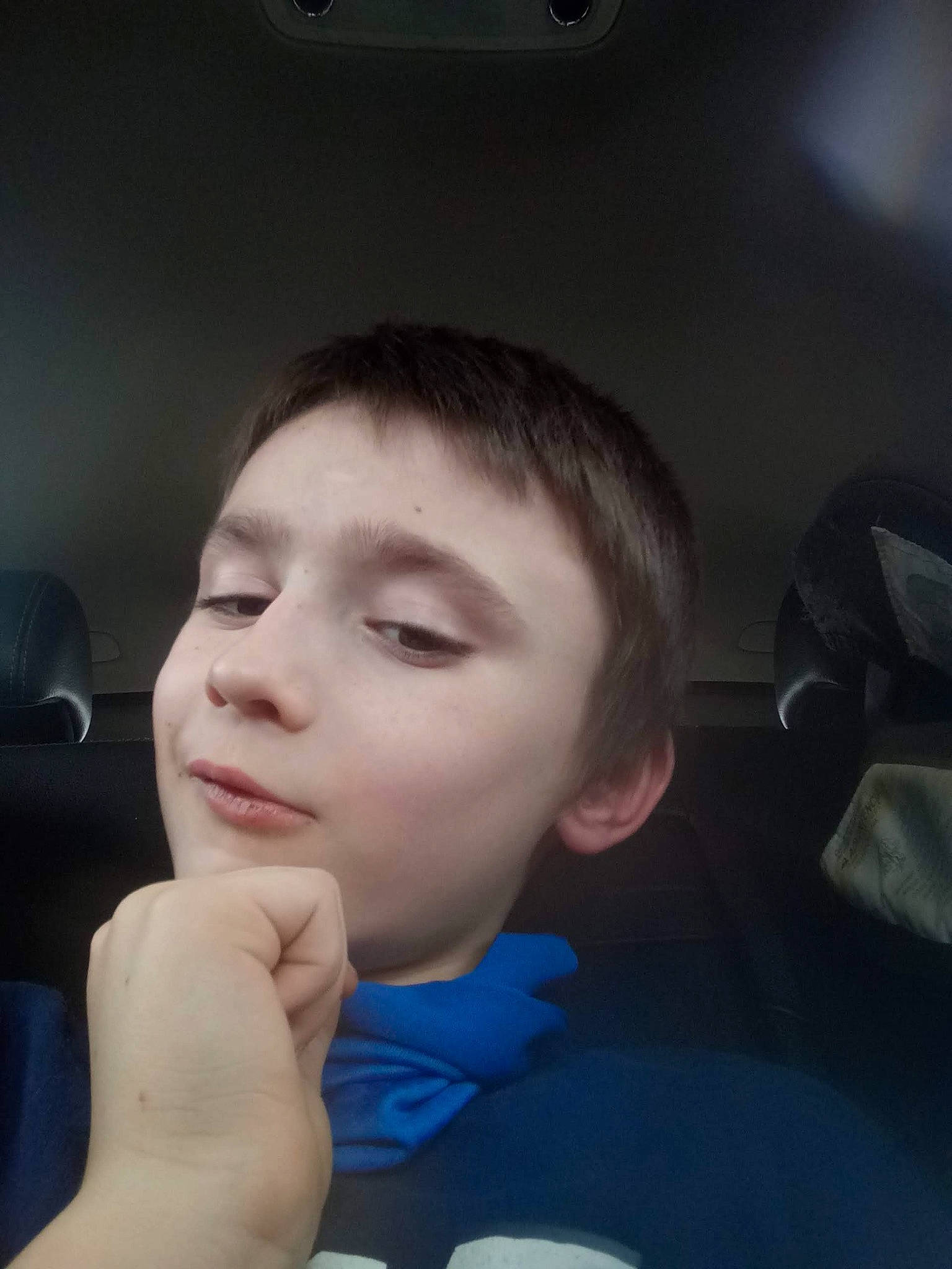 Gabriel is registered to the contest to win money with this photo: black_hair, cheek, child, chin, ear, electric_blue, eyebrow, eyelash, flash_photography, forehead, fun, gesture, happy, jaw, mouth, neck, nose, person, sitting, thumb