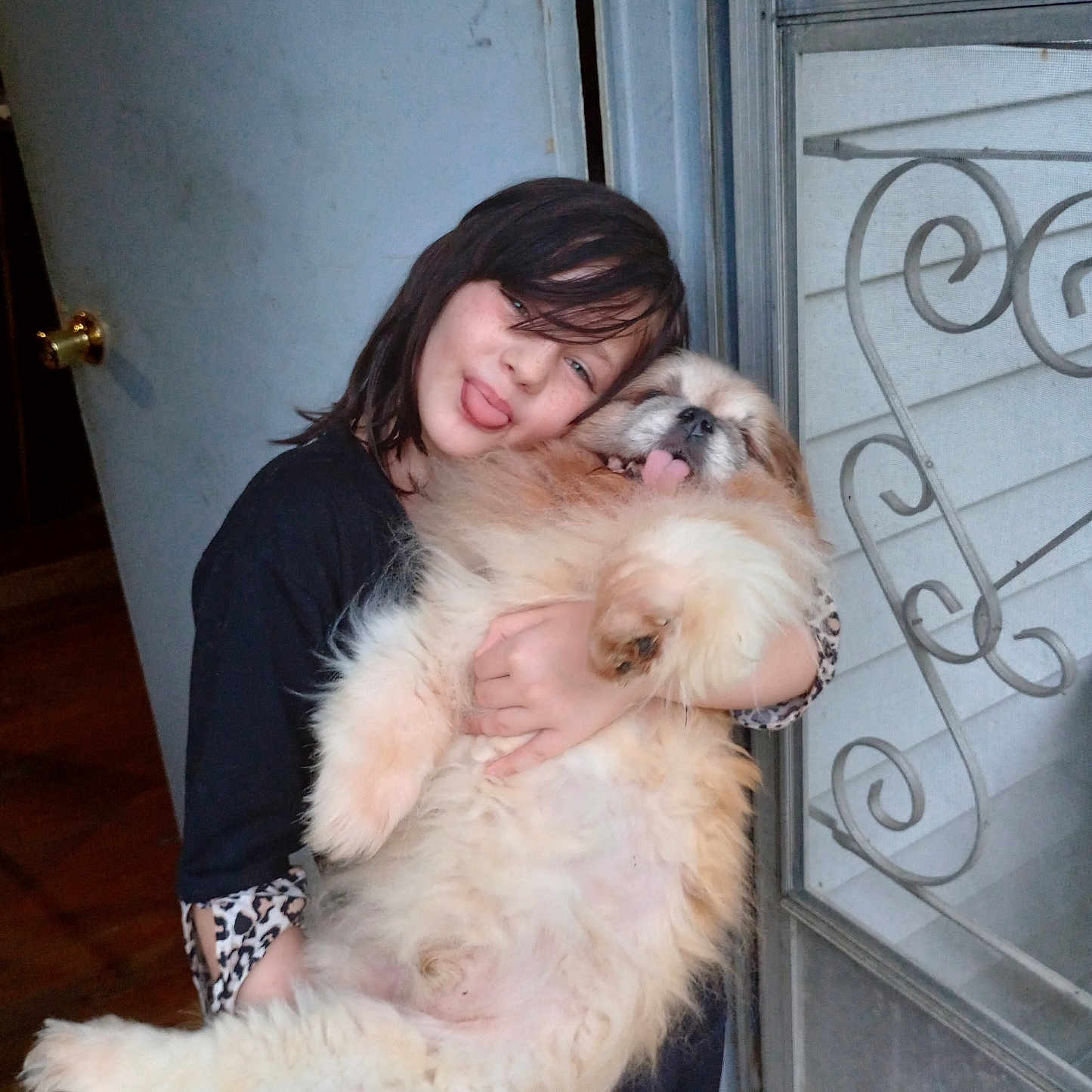 Alayna is registered to the contest to win money with this photo: accessories, adult, animal, canine, clothing, dog, door, face, female, glasses, head, indoors, lady, person, pet, photography, portrait, puppy, t_shirt, woman