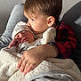 Maylon participe au concours pour gagner de l'argent avec cette photo : child, newborn, baby, toddler, blanket, couch, indoor, hug, love, family, sleeping, clothing, headwear, face, hand, comfort, affection, portrait, young, cozy